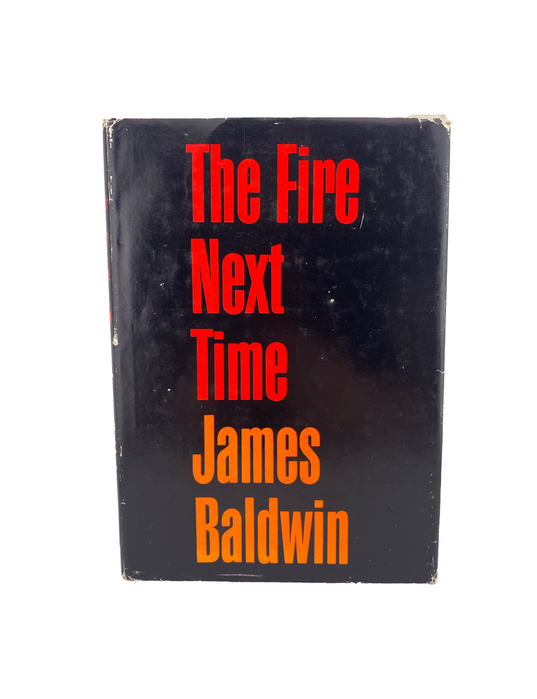 Item #998 the fire next time. james baldwin